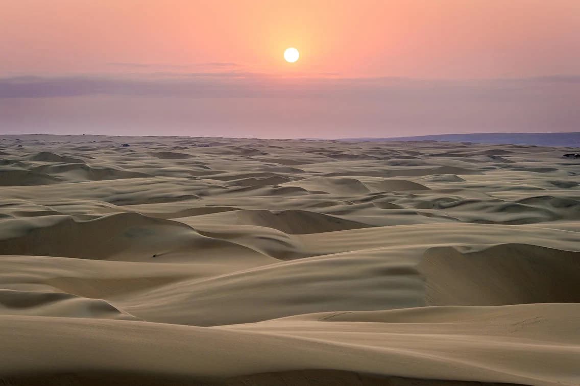Sunset over the dunes near Serra Cafema Lodge