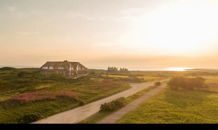 Severin's Resort & Spa among the dunes at dusk