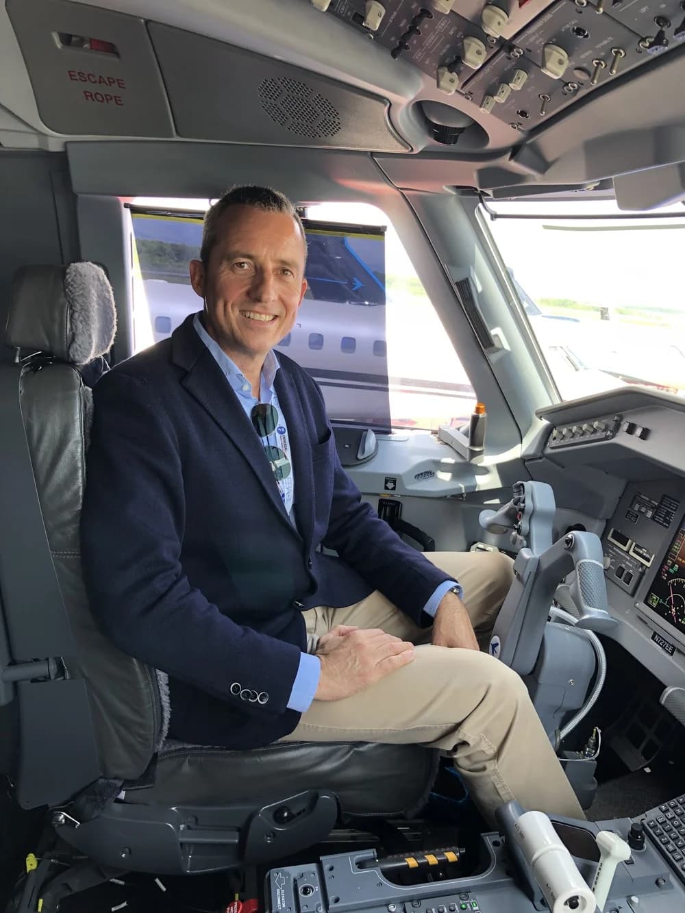 Lars Holling in the cockpit of an Embraer Lineage 1000 at EBACE in Geneva
