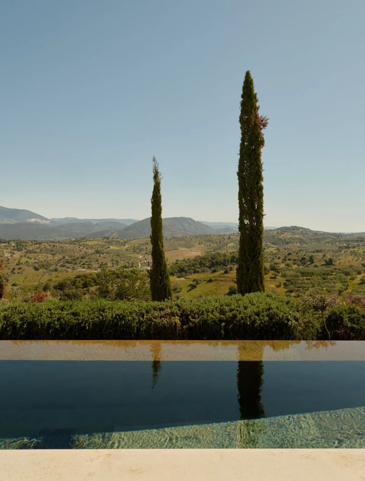 Amanzoe Resort – pool looking out over the landscape