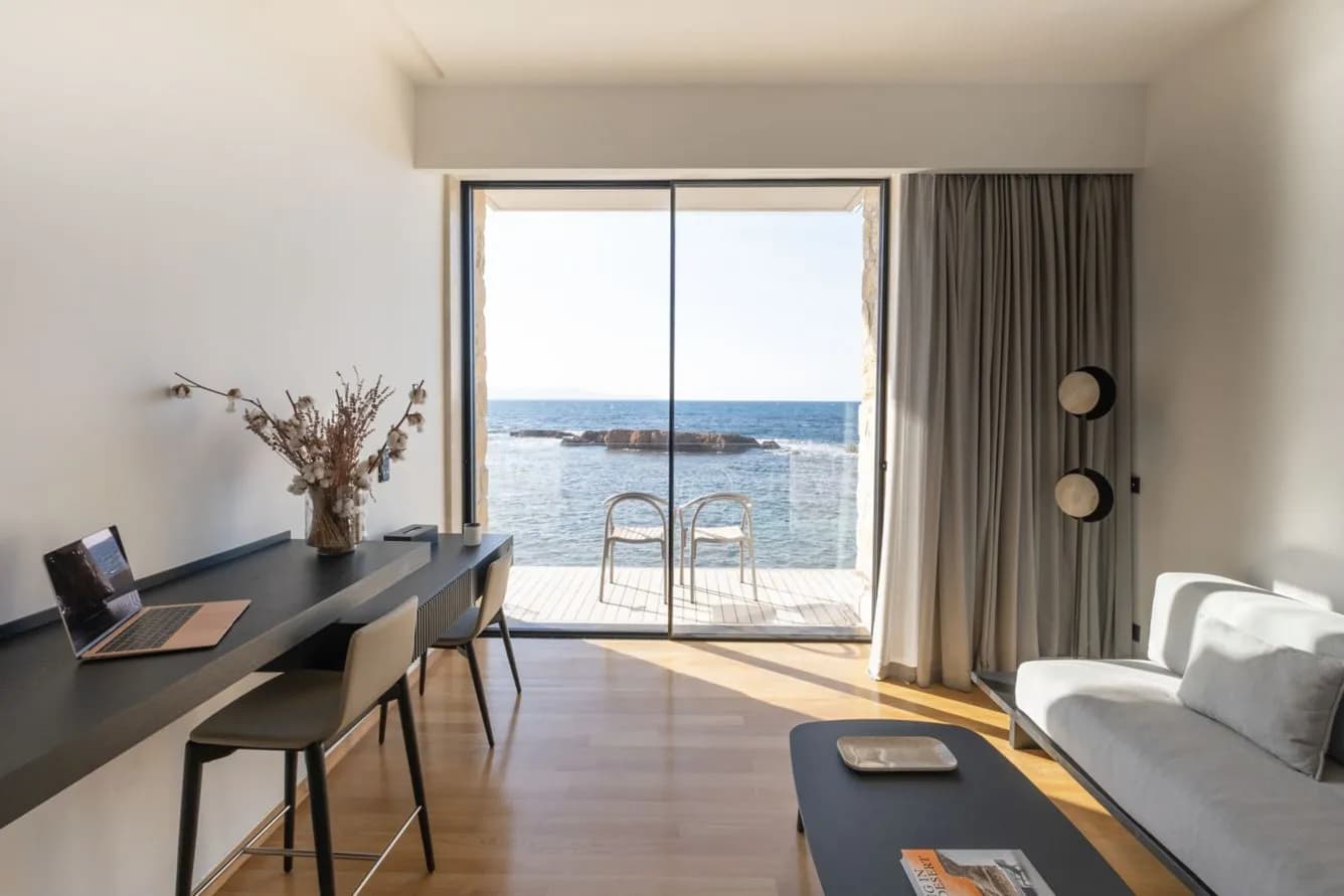 The Tanneries Chania – living area of a suite with a terrace facing the sea