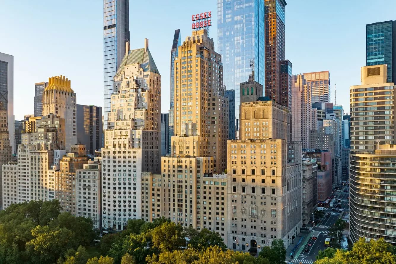The Essex House with its illuminated sign above Central Park