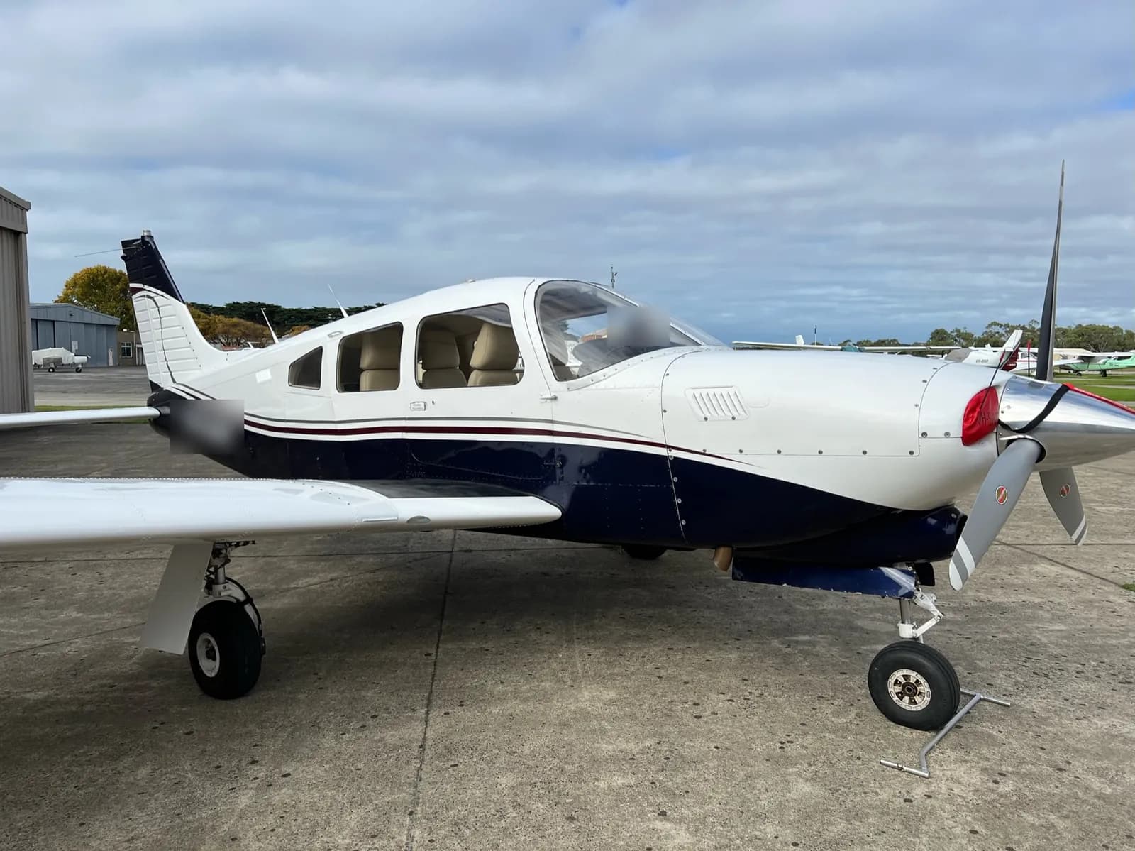 A Piper PA-28 on the apron